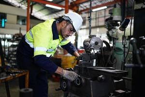 Professional men engineer worker skills quality, maintenance, training industry factory worker , warehouse Workshop for factory operators, mechanical engineering team production. photo