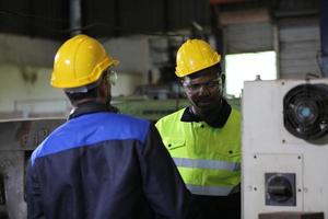 Professional men engineer worker skills quality, maintenance, training industry factory worker , warehouse Workshop for factory operators, mechanical engineering team production. photo