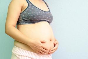 Closeup of pregnant woman photo