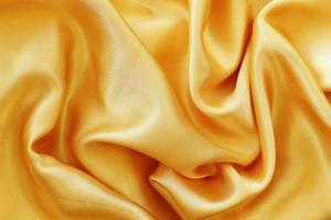 abstract background luxury cloth or liquid wave or wavy folds silk texture  background photo