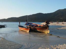 Tourists on the sunset beach on Koh Lipe photo