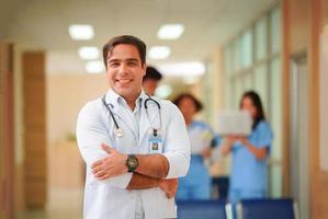 International doctor team. Hospital medical staff. Mixed race Asian and Caucasian doctor and nurse meeting. Clinic and stethoscope. photo