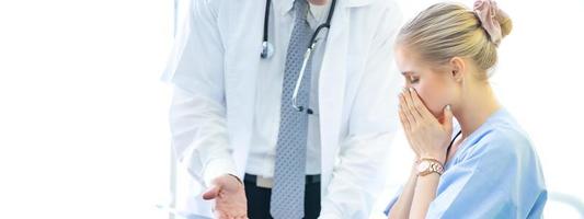 Doctor check up and discuss with patient in clinic or doctor talk with women patient in hospital photo