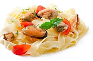 pasta with shrimps and tomatoes photo