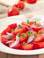 tomato cherry salad with  black pepper and onion photo