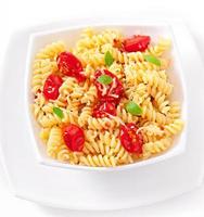 pasta with tomato, basil and grated cheese