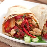 pita stuffed with chicken and peppers photo