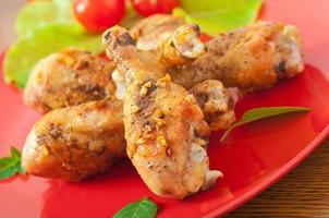 Grilled chicken legs and vegetables photo