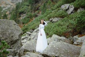 Bride near the Sea-eye lake in Poland