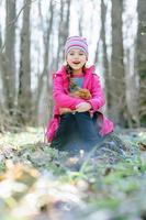 Little girl with a rabbit photo