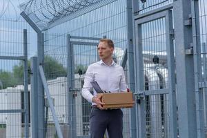 A businessman released from prison ponders what to do next. photo