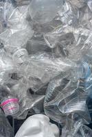 Rolled plastic bottles for recycling. photo