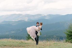 Running couple enjoying honeymoon adventure photo