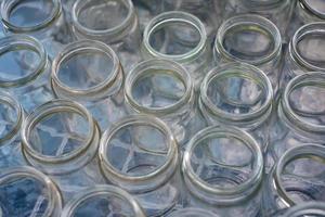 Sorting and collection of glass containers for recycling and reuse. photo