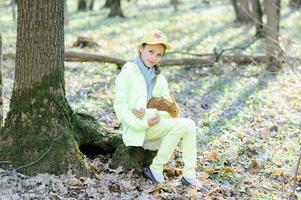 Little girl with a rabbit photo