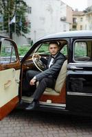 Handsome man in the car, businessman photo