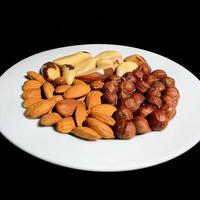 nuts on a white plate photo