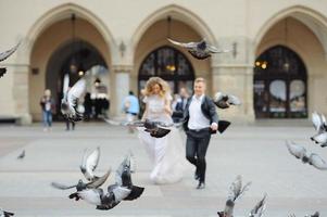 Two lovers walk along Krakow photo