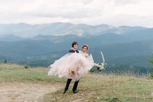 Running couple enjoying honeymoon adventure photo