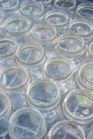 Sorting and collection of glass containers for recycling and reuse. photo