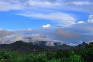 Mountain scenery full of fog . photo