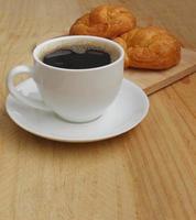 Cup of coffee and Croissant Breakfast Fast photo
