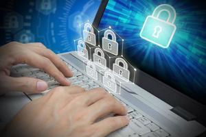 Businessman use Laptop with padlock on screen and padlock virtual technology, Cyber Security Data Protection Business Technology Privacy concept, Internet Concept of global business photo