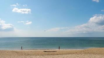 Widebody airplane approaching over ocean video