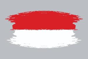 Brush painted flag Indonesia isolated on gray background. vector