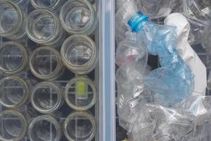 Plastic bottles, glass and cardboard are sorted for recycling. photo