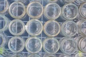 Sorting and collection of glass containers for recycling and reuse. photo