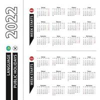 Two versions of 2022 calendar in Kazakh, week starts from Monday and week starts from Sunday. vector