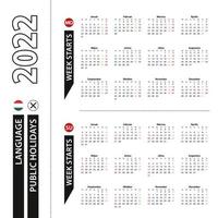 Two versions of 2022 calendar in Hungarian, week starts from Monday and week starts from Sunday. vector