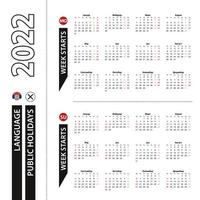 Two versions of 2022 calendar in Serbian, week starts from Monday and week starts from Sunday. vector