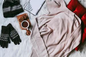 Creative flat lay composition for winter fashion background photo