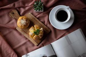 Garlic Cheese Bread or Yugjjog Maneulppang is Korean Popular Street Food served on the table photo