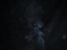 smoke texture on black background. photo