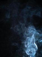 smoke texture on black background. photo