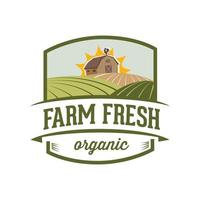 an emblem logo image depicting a barn and farm field as icon for healthy organic product vector