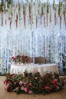 The presidium of the newlyweds in the banquet hall of the restaurant photo