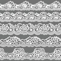 Set of white lace borders isolated on gray background vector