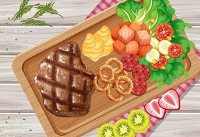 Top view of meat steak on wooden tray vector