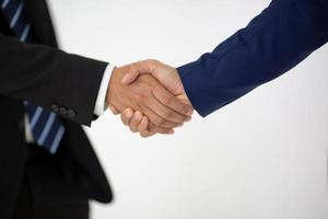 Businessman handshake for teamwork of business merger and acquisition,successful negotiate,hand shake,two businessman shake hand with partner to celebration partnership and business deal concept photo