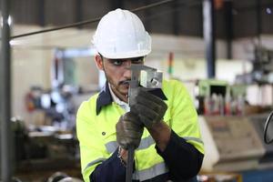Professional men engineer worker skills quality, maintenance, training industry factory worker , warehouse Workshop for factory operators, mechanical engineering team production. photo
