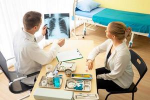 Doctor and patient in hospital photo