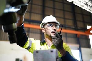 Professional men engineer worker skills quality, maintenance, training industry factory worker , warehouse Workshop for factory operators, mechanical engineering team production. photo