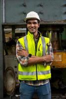 Foreman or worker work at factory site check up machine or products in site. Engineer or Technician checking Material or Machine on Plant. Industrial and Factory. photo
