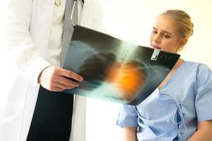 Doctor and patient in hospital photo