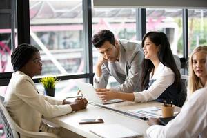 Group of diverse business people collaborating in office or Multiethnic business people in meeting. photo