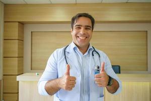 International doctor team. Hospital medical staff. Mixed race Asian and Caucasian doctor and nurse meeting. Clinic and stethoscope. photo